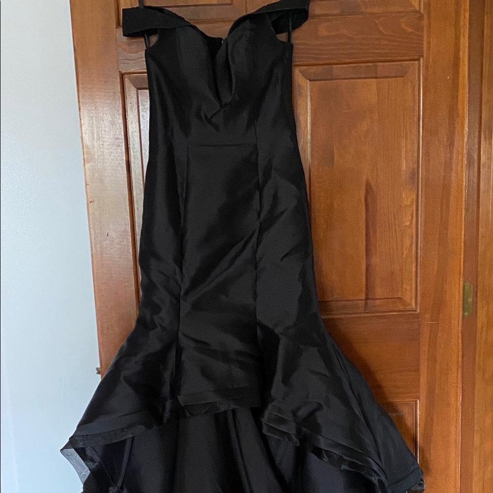 Jovani black mermaid off the shoulder prom dress.